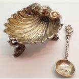 Hallmarked silver shell open salt with figural feet and spoon