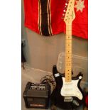 Behringer electric guitar and Roland micro cube amp