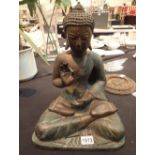 Cast bronze early 19thC Sino Tibetian Buddah seated in full Lotus position his right hand in the