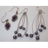 Two pairs of silver drop earrings one genuine pearl and one amethyst