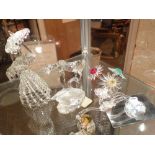 Swarovski crystal collection of crystal figurines including lady with umbrella three flowers swan