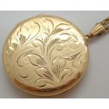 9ct gold large locket on a 9ct chain 18.