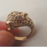 14ct gold stone set Leopard head ring