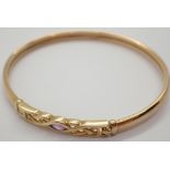 9ct gold amethyst set Celtic bangle 5.