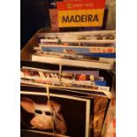 Box of 2004 foreign postcards and travel book