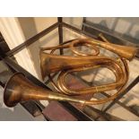 Three brass and copper horns