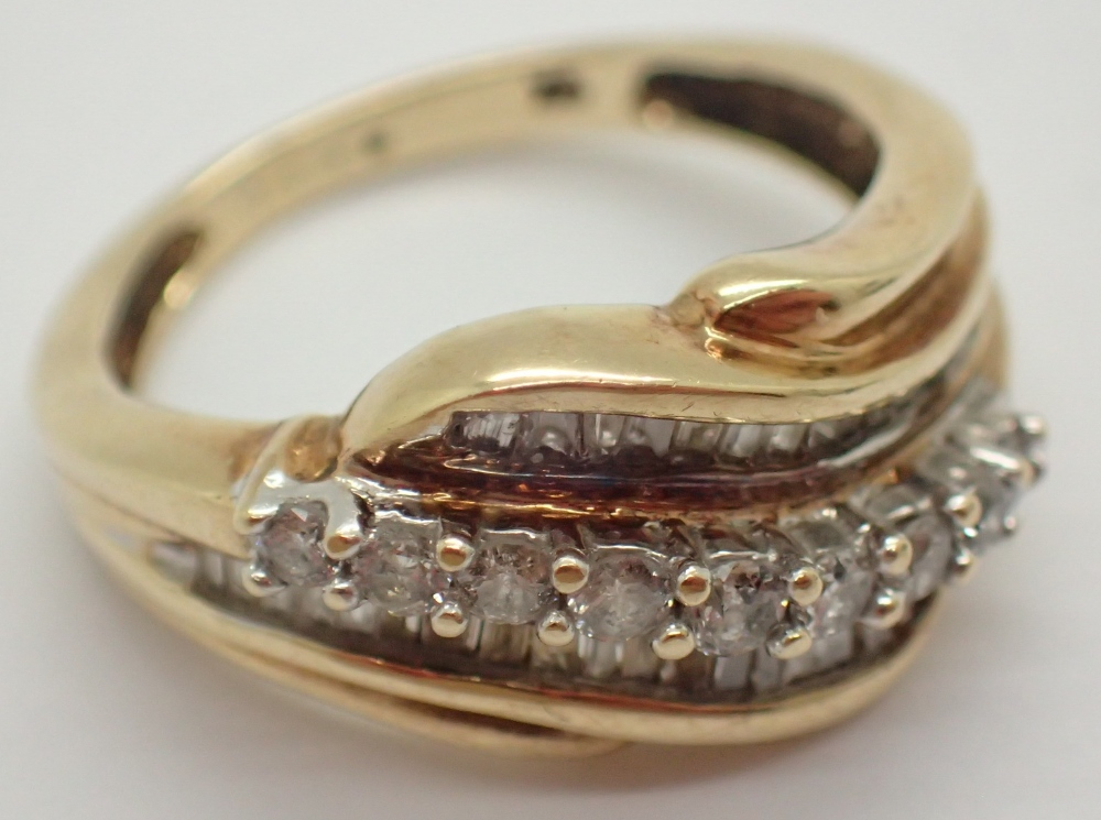 9ct gold fancy baguette and round brilliant diamond ring size J 0.5ct 3.