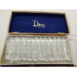 Set of twelve Art Deco Daum France crystal knife rests c1930 with original box each crystal L: 9 cm