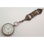 Continental 935 silver cased ladies fob watch having Roman chapters to the painted enamel dial