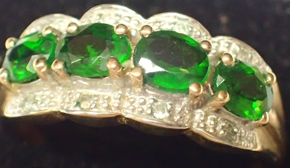 9ct gold four emerald and white stone ring size P 3.