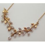 9ct white and yellow gold diamond set necklace 2.