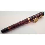 Parker Duofold Centennial fountain pen with red marble effect barrel and 18ct gold nib