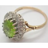 9ct gold peridot and diamond cluster ring size Q containing an approximate total of 1.