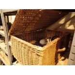 Wicker picnic basket containing gas cylinders