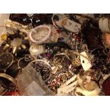 Tray of unsorted costume jewellery