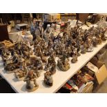 Large quantity of figurines full table