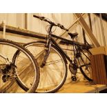 Cross hybrid 18 speed bicycle with rear rack