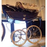 Childs Silver Cross pram in navy blue