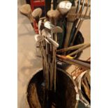 Collection of mixed golf clubs