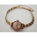 9ct gold ladies Rotary wristwatch on 9ct gold bracelet 13.