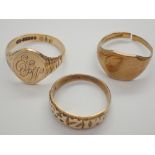 Three 9ct gold rings ( one cut ) 10.