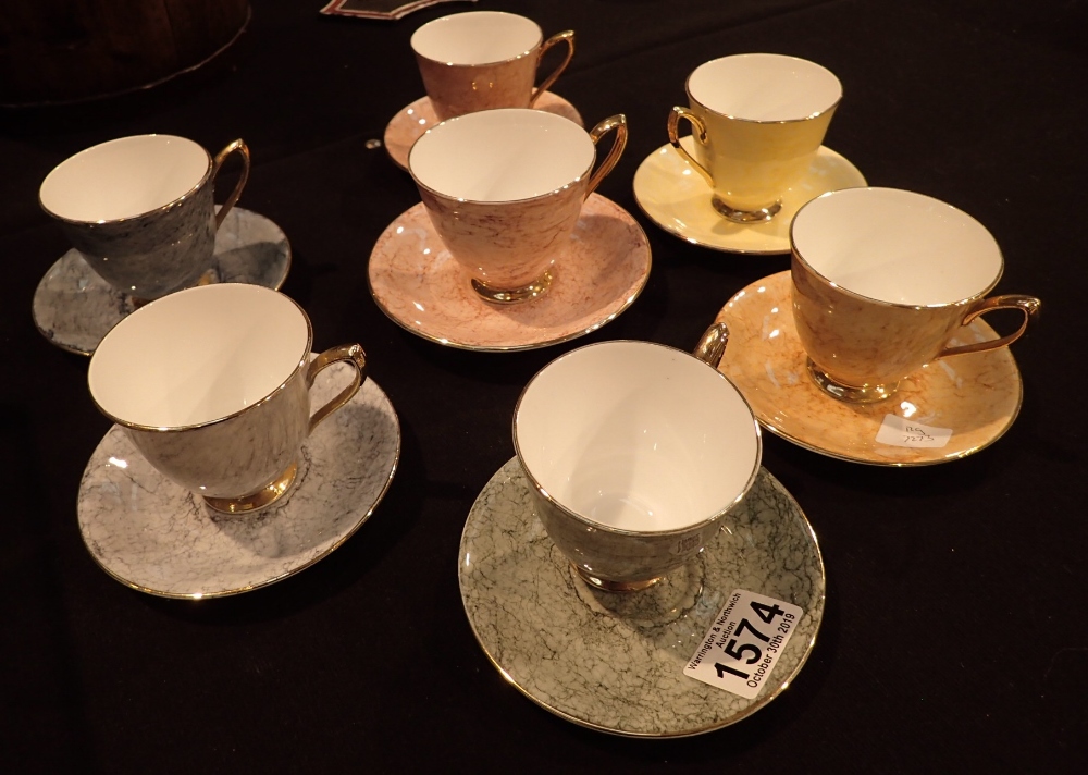 Seven Royal Albert cocktail cups and saucers in the Gossamer pattern