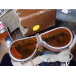 Pair of brown leather amber tinted safety googles