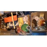 Four boxes on two shelves of mixed household figurines ornaments and tea ware