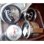 Four car related gauges to include battery oil gauges and two tyre gauges