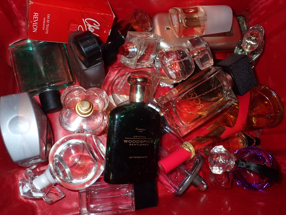 Box of part used perfume bottles and gents aftershaves