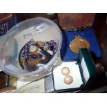 Box of mixed jewellery and a medal