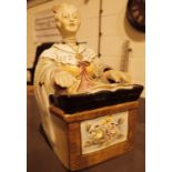 Ceramic figurine of a lady playing the piano