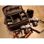 Camera bag containing two 35mm Pentax Asahi cameras a 35mm lens three converters a 28mm lens and