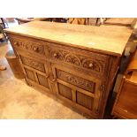 Oak sideboard with two carved drawers and lower cupboards 122 x 48 x 87 cm