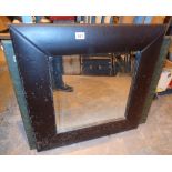 Two modern mirrors one with leather frame