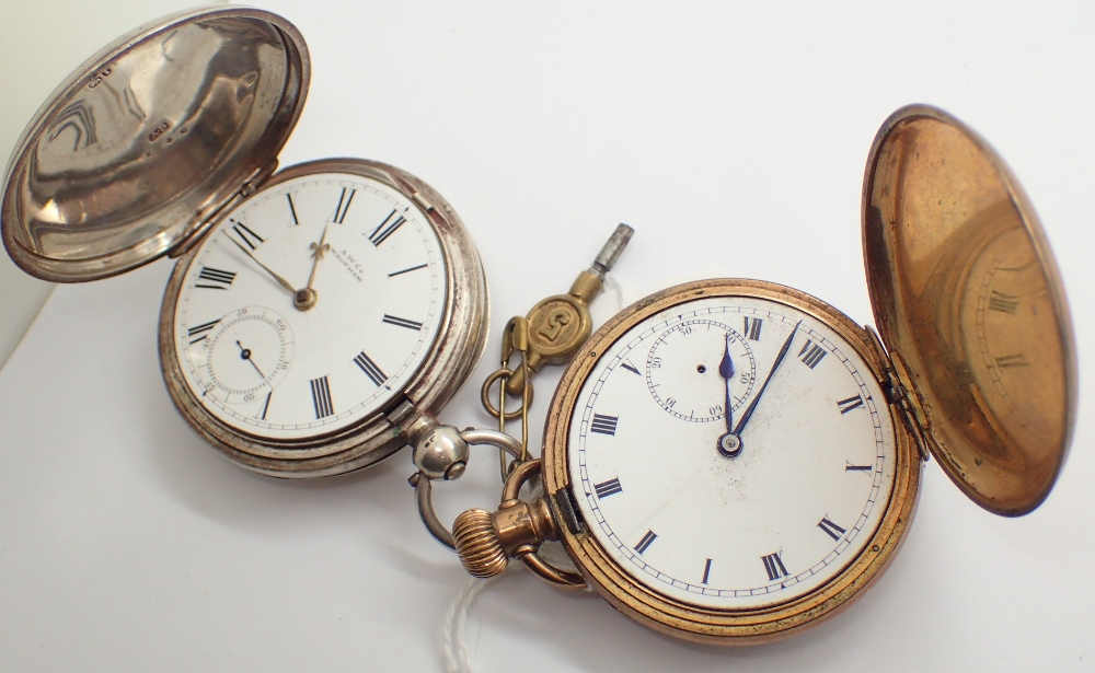 Hallmarked silver key wind full hunter pocket watch and a gold plated example