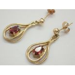 9ct gold garnet set drop earrings complete with backs and hallmarks to posts