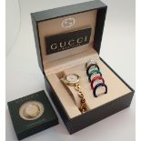 Gucci wristwatch with interchangable bezel CONDITION REPORT: Requires new battery.