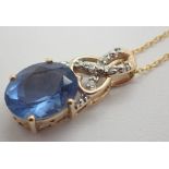 10K blue and white stone pendant on 10K necklace