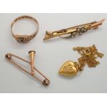 Two 9ct gold bar brooches a 9ct gold ring and a 10K heart with chain