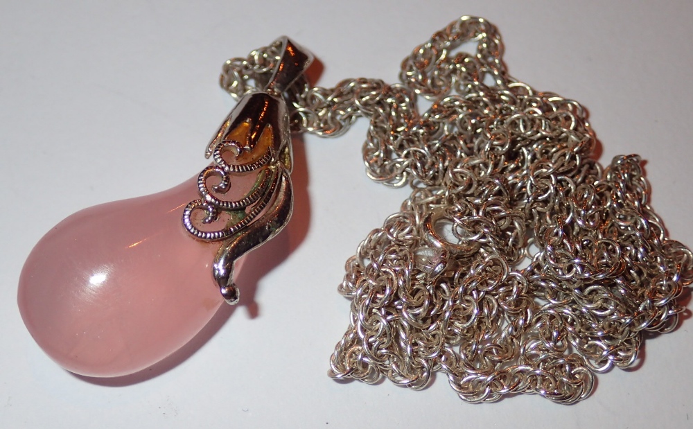 Silver rose quartz pendant on silver cha