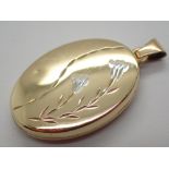 9ct gold oval locket complete with inter