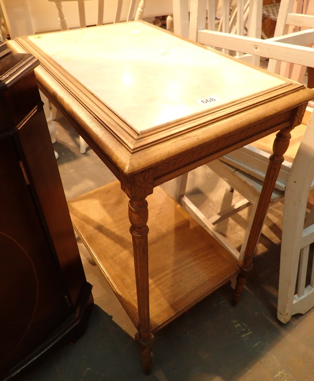 Small two tiered table with marble top a