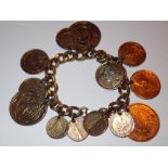 Yellow metal coin charm bracelet