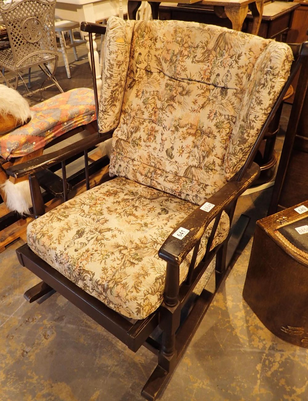 Spindleback rocking chair with upholster