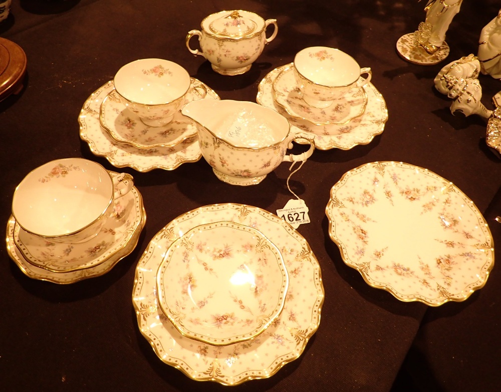 Part Royal Crown Derby tea service in the Royal Antoinette pattern to include plates cups and