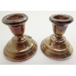 Hallmarked silver pair of stub candlesticks assay Birmingham 1957 H: 5 cm