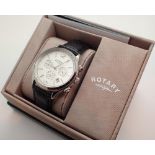 Rotary wristwatch with box and papers