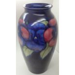 Moorcroft vase in the blue Pansy pattern H: 25 cm CONDITION REPORT: Few minor glaze