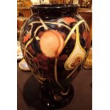 Emma Bossons large Moorcroft vase in the Queens Choice pattern H: 43 cm